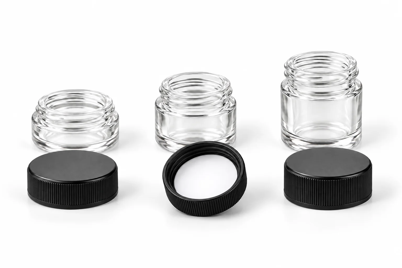 Clear concentrate jars with black lids shown together for jar and closure fit review
